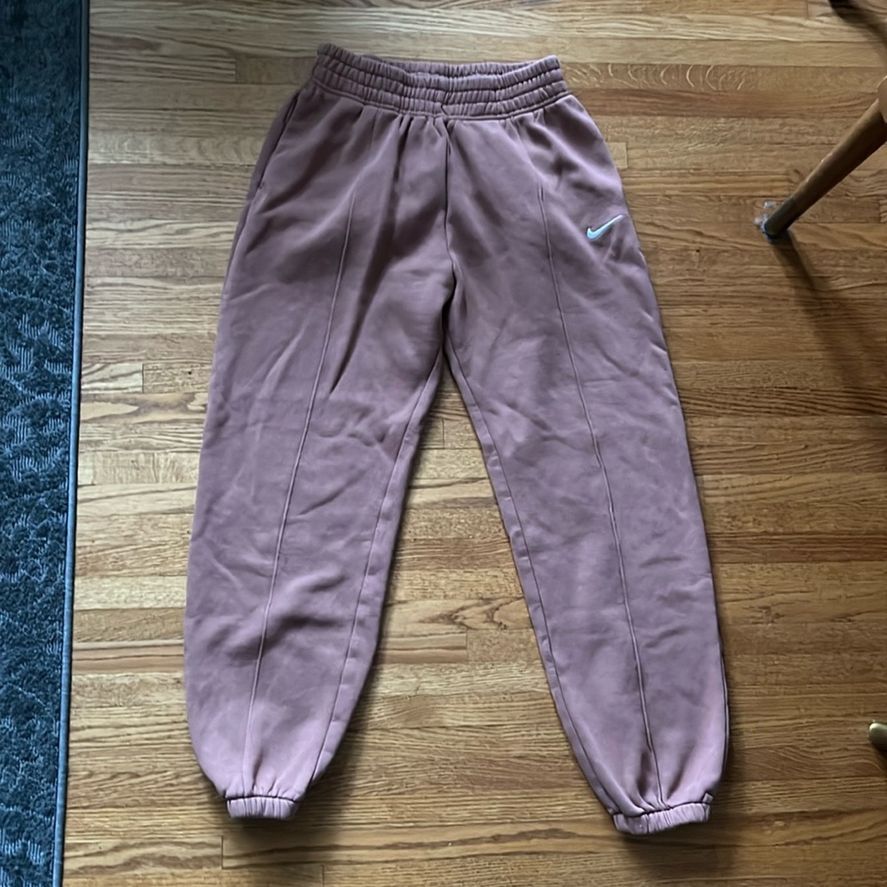 dark orange Nike sweats